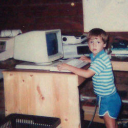 Young Scott at a computer